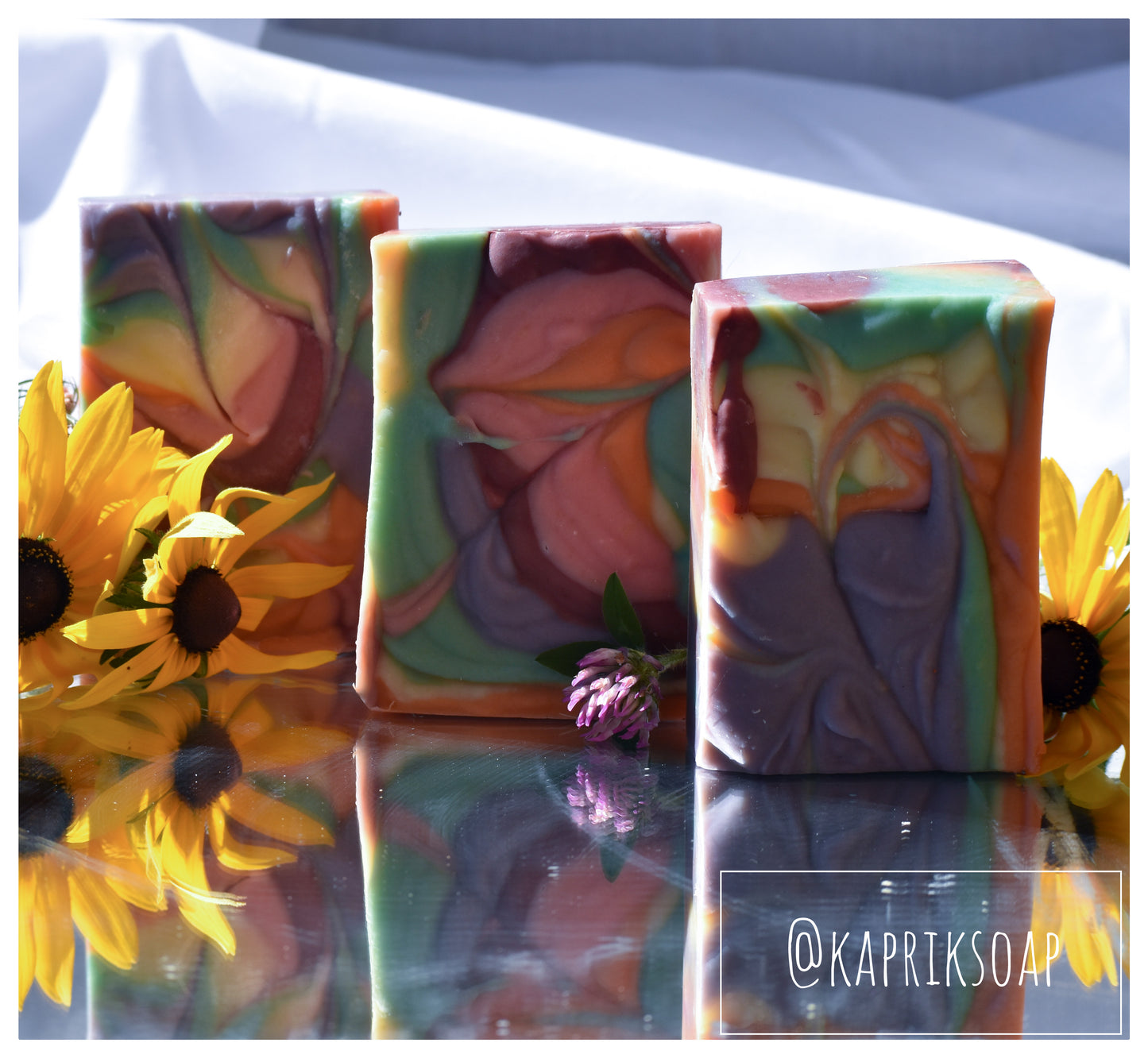 three bars Paris soap showing all 6 colors